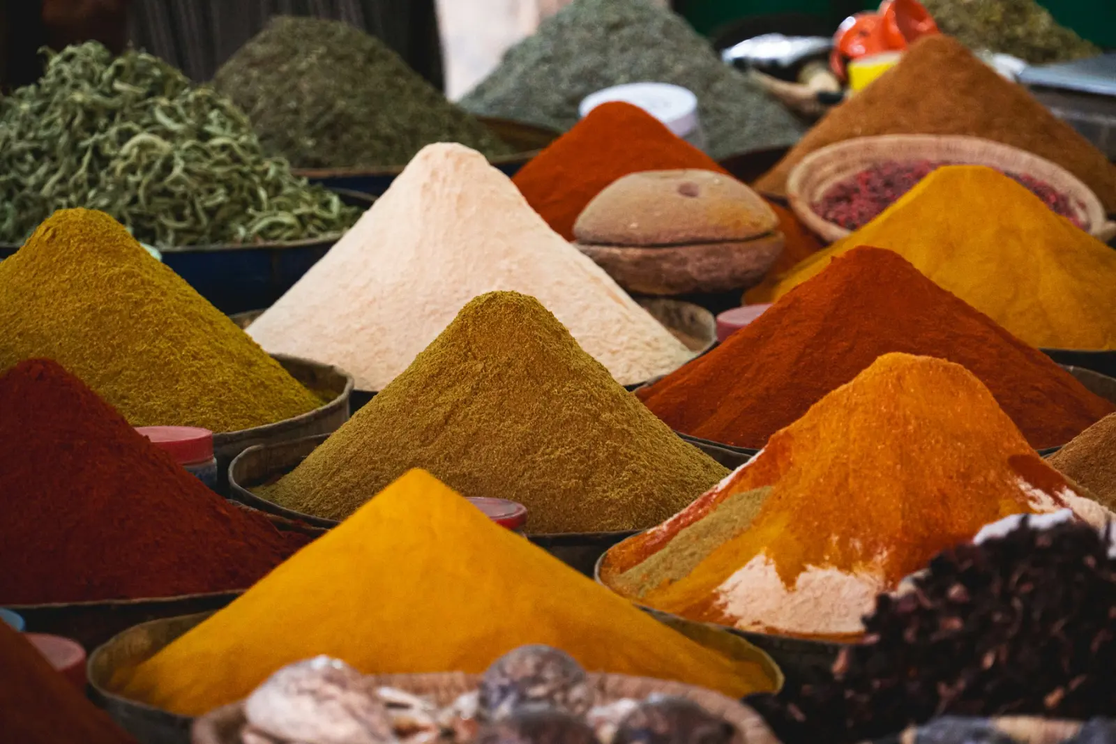 Heaps of ground spices in a spice market